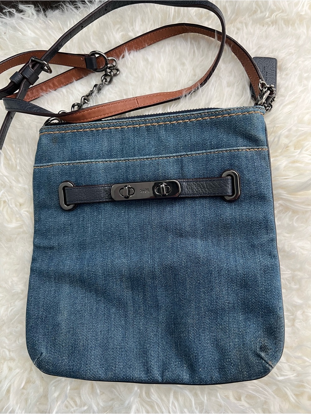 Coach denim Swagger swingpack crossbody bag.